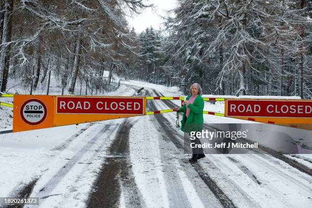 Road Closed sign on the A939 between Corgarff and the Lecht on November 29, 2023 in Lecht Scotland. On Tuesday, the Met Office issued a warning for...