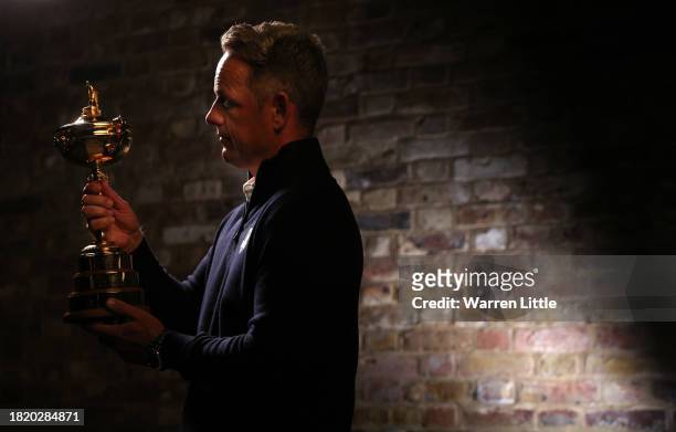 European Ryder Cup Captain, Luke Donald poses with the Ryder Cup on November 28, 2023 in London, England.