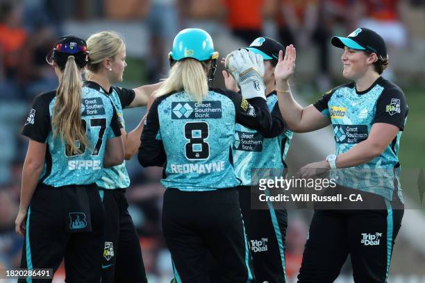 Charli Knott of the Heat celebrates after taking the wicket of Chloe Piparo of the Scorchers during The Challenger WBBL finals match between Perth...