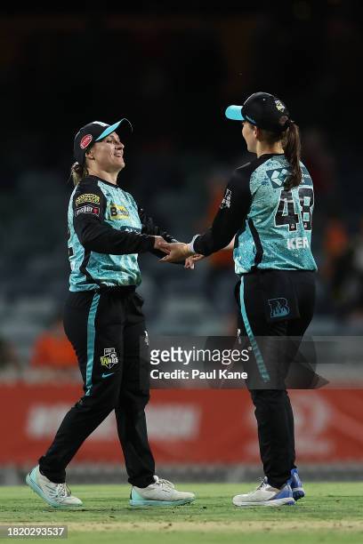Mignon Du Preez and Amelia Kerr of the Heat celebrate winning The Challenger WBBL finals match between Perth Scorchers and Brisbane Heat at the WACA,...