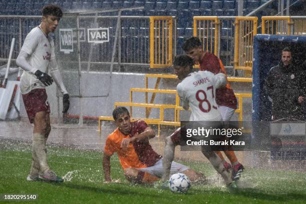 Malachi Sharpe of Manchester United is in action with Eren Pasahan of Galatasaray during the UEFA Youth League match between Galatasaray A.S. And...