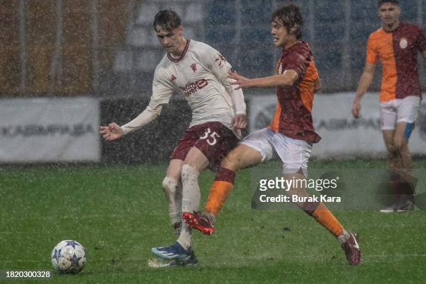 Jack Flatcher of Manchester United is in action with Efe Akman of Galatasaray during the UEFA Youth League match between Galatasaray A.S. And...