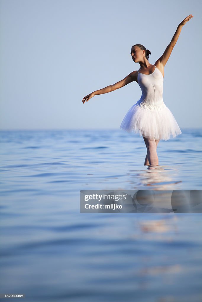 Ballerina dancing in the sea