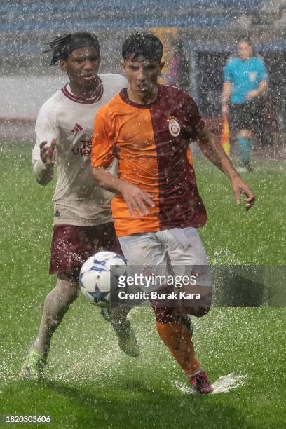 Malachi Sharpe of Manchester United is in action with Kadir Subasi of Galatasaray during the UEFA Youth League match between Galatasaray A.S. And...