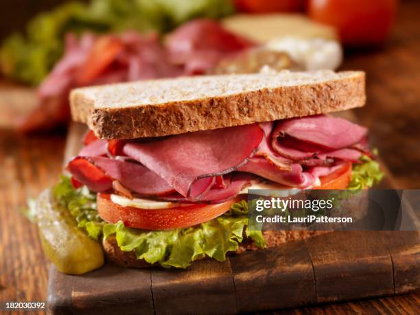 pastrami sandwich - whole wheat sandwich stock pictures, royalty-free photos & images