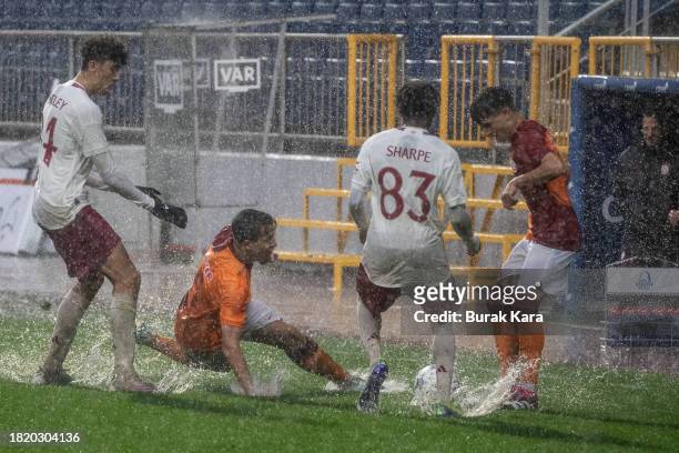 Malachi Sharpe of Manchester United is in action with Eren Pasahan of Galatasaray during the UEFA Youth League match between Galatasaray A.S. And...