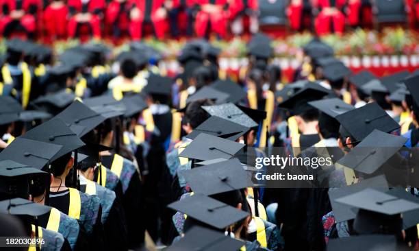 group of graduates - graduation gown stock pictures, royalty-free photos & images