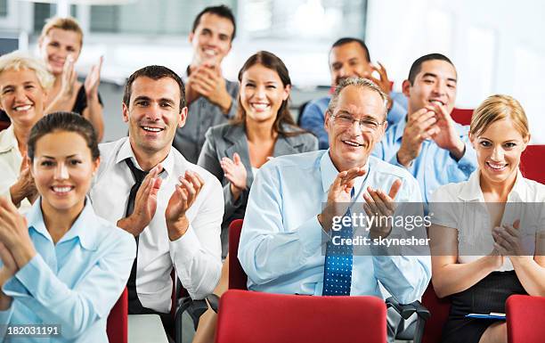 businesspeople applauding during seminar. - crowd applauding stock pictures, royalty-free photos & images