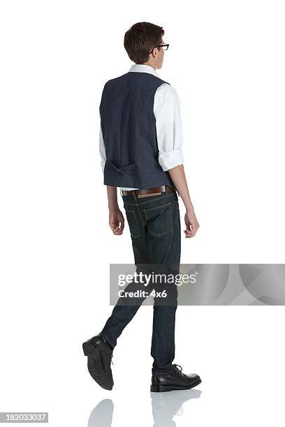 man walking - man with shirt sleeves rolled up waistcoat stock pictures, royalty-free photos & images