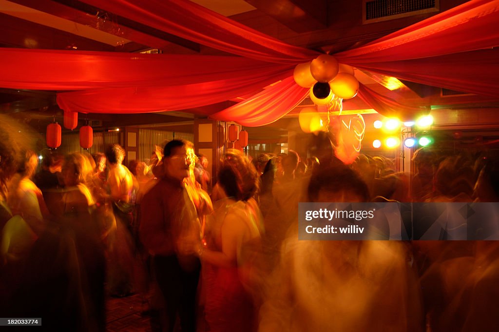 Blurry image of people partying