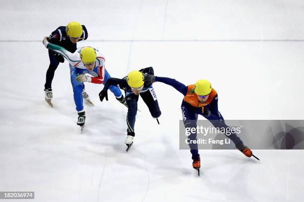 Niels Kerstholt of Netherlands, Daisuke Uemura of Japan, Tommaso Dotti of Italy and Park Se Yeong of Korea compete in the Men's 1000m Heats during...