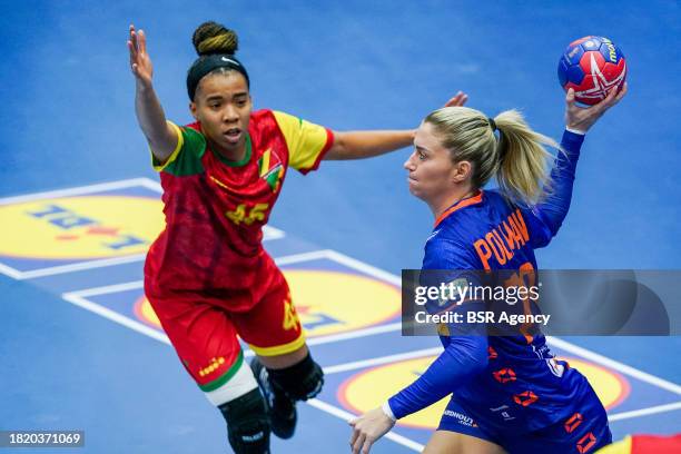 Josephine Line Maxime Nkou of Congo, Estavana Polman of the Netherlands during the 26th IHF Women's World Championship Handball Preliminary Round...