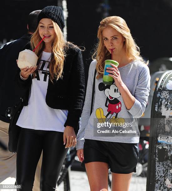 Gigi Foster and Erin Heatherton are seen in Soho on September 27, 2013 in New York City.