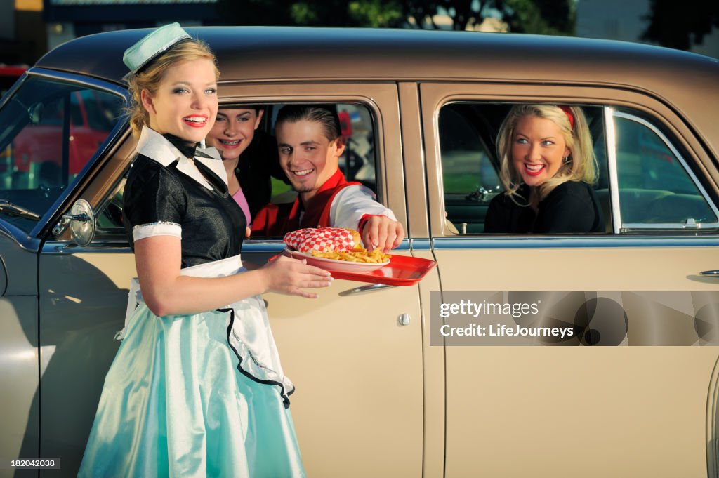 Fifties Drive In With Car Hop and Customers