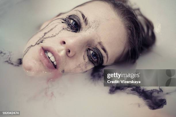 dissolution. the rivers of tears - woman mascara stock pictures, royalty-free photos & images