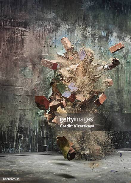 explosion wall - broken wall stock pictures, royalty-free photos & images