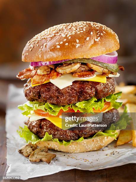 really big burger - giant cheeseburger stock pictures, royalty-free photos & images