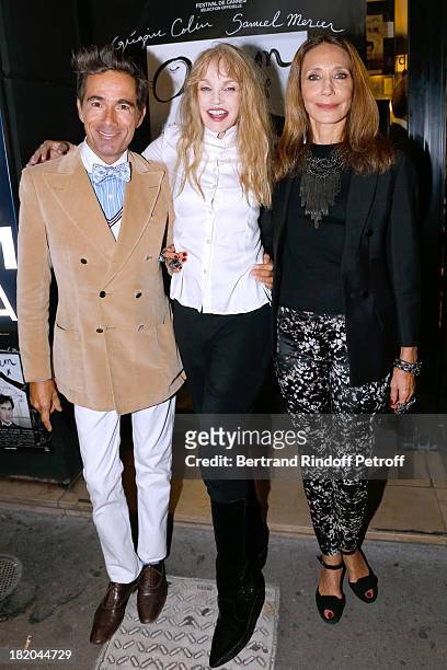 Director of the movie Arielle Dombasle between actors of the movie Vincent Darre and Marisa Berenson attend 'Opium' movie Premiere, held at Cinema...