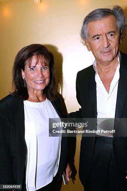 Journalist Anne Sinclair and writer Bernard-Henri Levy attend 'Opium' movie Premiere, held at Cinema Saint Germain in Paris on September 27, 2013 in...