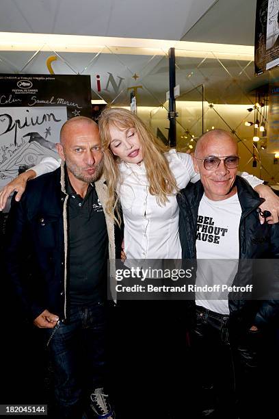 Director of the movie Arielle Dombasle between Photographers Pierre and Gilles attend 'Opium' movie Premiere, held at Cinema Saint Germain in Paris...