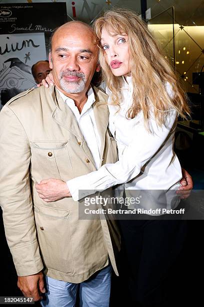 Fashion designer Christian Louboutin and Director of the movie Arielle Dombasle attend 'Opium' movie Premiere, held at Cinema Saint Germain in Paris...