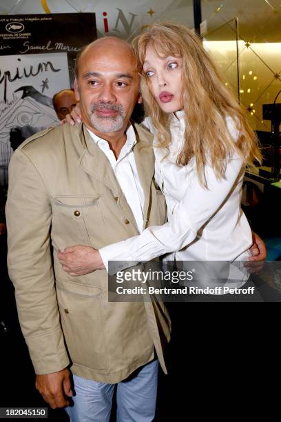 Fashion designer Christian Louboutin and Director of the movie Arielle Dombasle attend 'Opium' movie Premiere, held at Cinema Saint Germain in Paris...