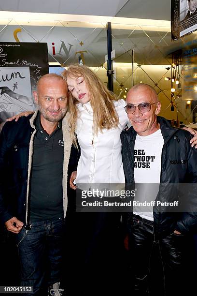 Director of the movie Arielle Dombasle between Photographers Pierre and Gilles attend 'Opium' movie Premiere, held at Cinema Saint Germain in Paris...