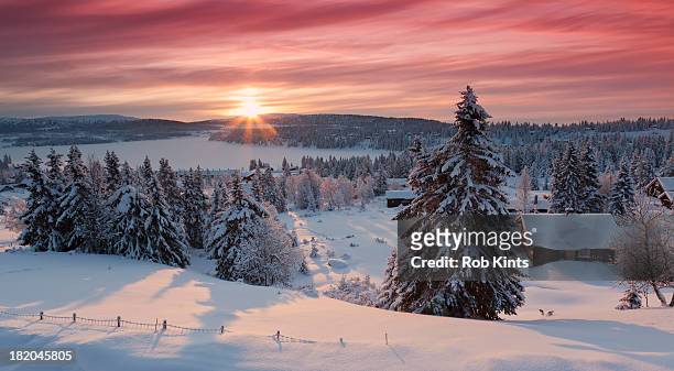 sunrise on snow covered village sjusjøen - lillehammer stock pictures, royalty-free photos & images