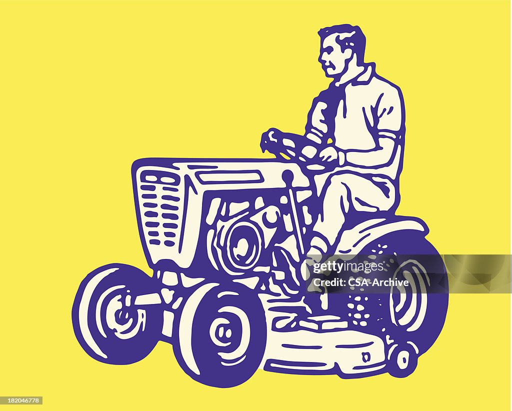 Man Driving Lawn Tractor
