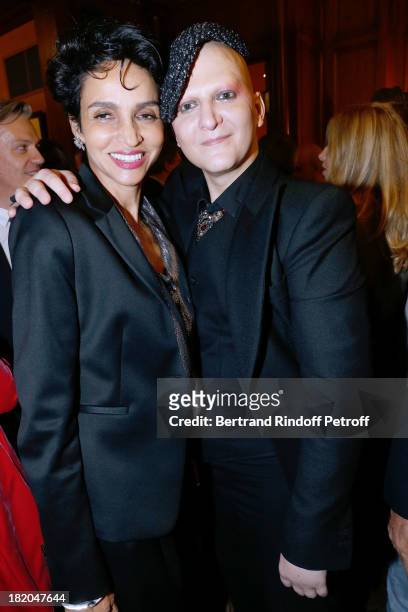Farida Khelfa and Artist Ali Mahdavi attend the 'Opium' movie premiere, held at Cinema Saint Germain in Paris on September 27, 2013 in Paris, France.