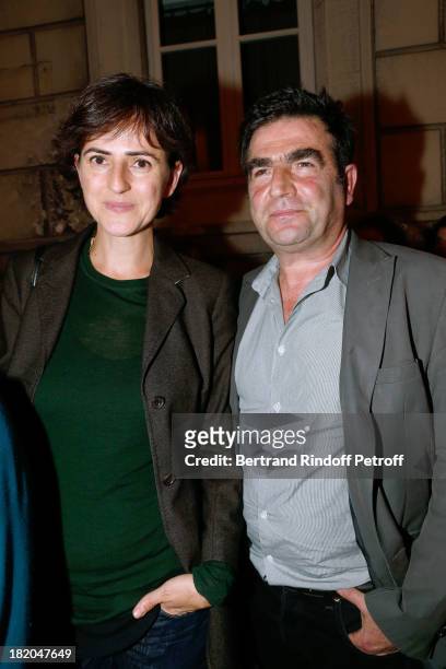 Romain Bouteille and his wife attend the 'Opium' movie premiere, held at Cinema Saint Germain in Paris on September 27, 2013 in Paris, France.