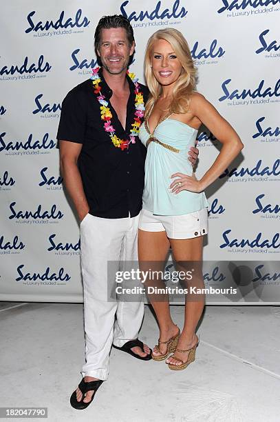 Slade Smiley and Gretchen Rossi attend the Junkanoo Beach Party & Dinner during Day One of the Sandals Emerald Bay Celebrity Getaway And Golf Weekend...