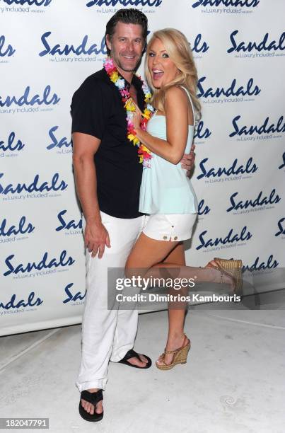 Slade Smiley and Gretchen Rossi attend the Junkanoo Beach Party & Dinner during Day One of the Sandals Emerald Bay Celebrity Getaway And Golf Weekend...