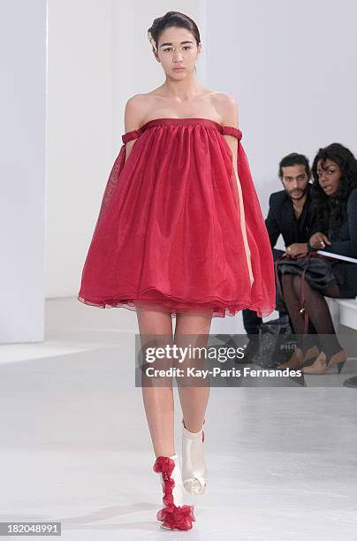 Model walks the runway during the Audra show as part of the Paris Fashion Week Womenswear Spring/Summer 2014 at the Espace Commines on September 27,...