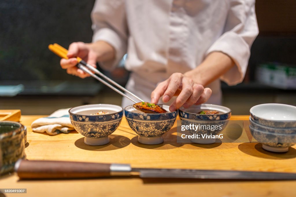 Chef is making Foie gras rice in Japanese Omakase in the restaurant
