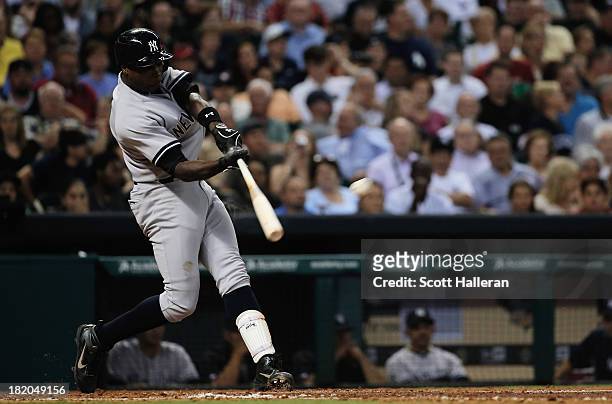 Alfonso Soriano of the New York Yankees connects on a double in the sixth inning against the Houston Astros at Minute Maid Park on September 27, 2013...