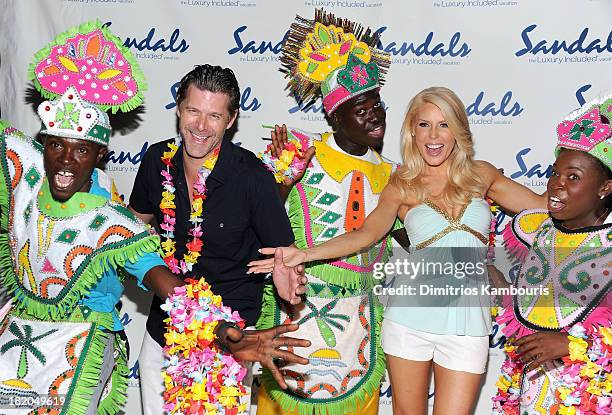 Slade Smiley and Gretchen Rossi attend the Junkanoo Beach Party & Dinner during Day One of the Sandals Emerald Bay Celebrity Getaway And Golf Weekend...