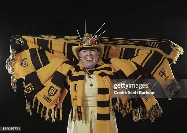 Hawthorn Hawks fan poses ahead of the 2013 AFL Grand Final match between the Hawthorn Hawks and the Fremantle Dockers at the Melbourne Cricket Ground...