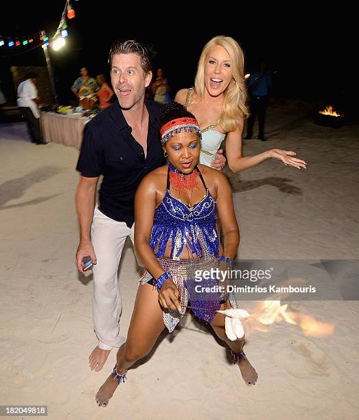 Slade Smiley and Gretchen Rossi attend the Junkanoo Beach Party & Dinner during Day One of the Sandals Emerald Bay Celebrity Getaway And Golf Weekend...