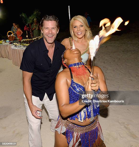 Slade Smiley and Gretchen Rossi attend the Junkanoo Beach Party & Dinner during Day One of the Sandals Emerald Bay Celebrity Getaway And Golf Weekend...