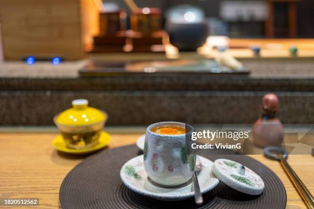 chawanmushi in japanese omakase in the restaurant - chawanmushi stock pictures, royalty-free photos & images