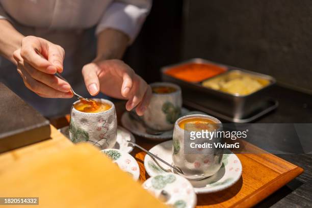 chawanmushi in japanese omakase in the restaurant - chawanmushi stock pictures, royalty-free photos & images