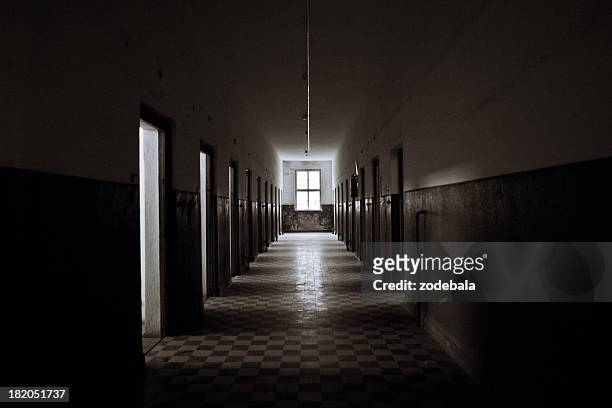 old abandoned prision corridor - spooky stock pictures, royalty-free photos & images