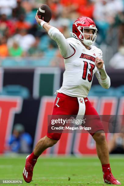 Jack Plummer of the Louisville Cardinals throws a pass against the Miami Hurricanes during the second quarter of the game at Hard Rock Stadium on...
