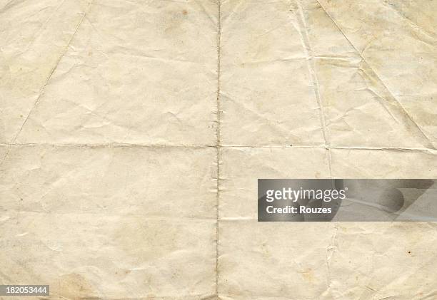distressed antique paper - folded stock pictures, royalty-free photos & images