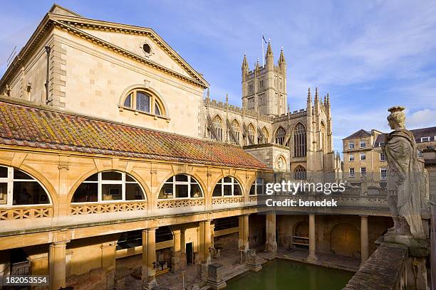 roman baths and the bath abbey in bath england somerset - roman bath england stock pictures, royalty-free photos & images