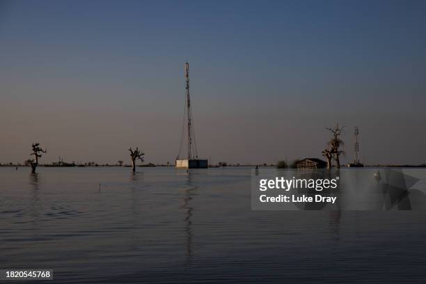 Partly submerged structures, on land that was previously a residential community, as seen on November 28, 2023 in Bentiu, South Sudan. Climate change...