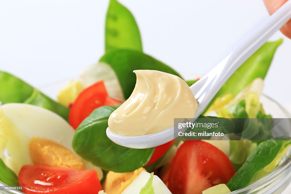 Spoon of mayonnaise