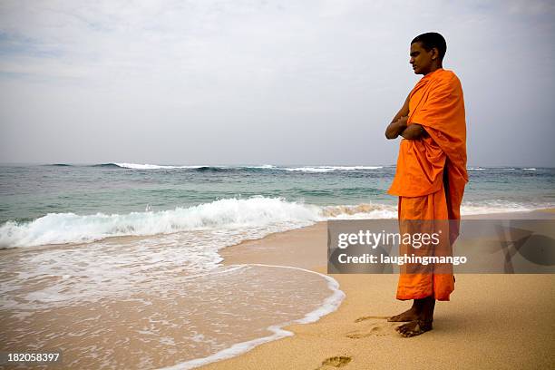 buddhist monk sri lanka beach - monks stock pictures, royalty-free photos & images