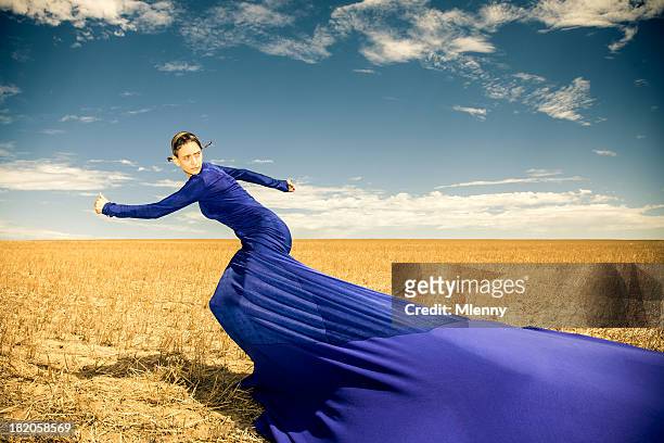 looking back in motion, women surreal fashion - artists model stock pictures, royalty-free photos & images